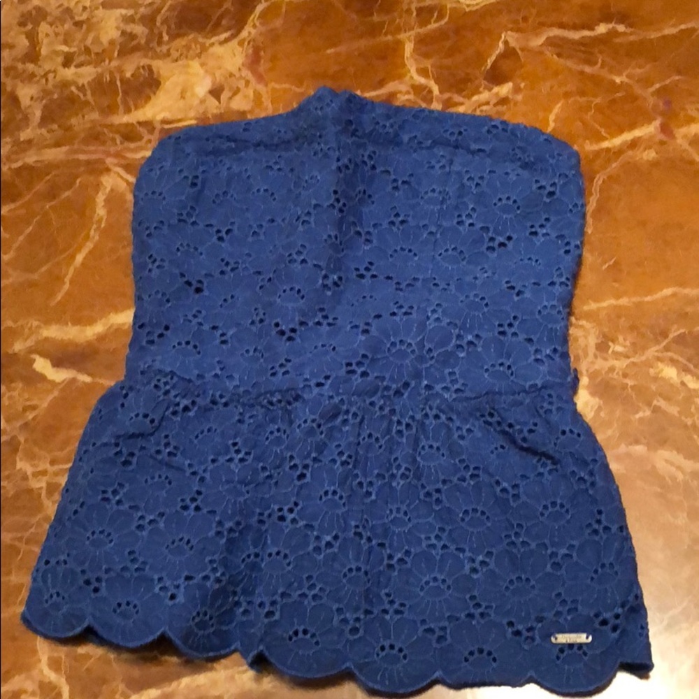 A blue backless shirt